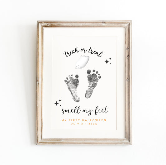 Framed keepsake print with footprints and Halloween text on a white background