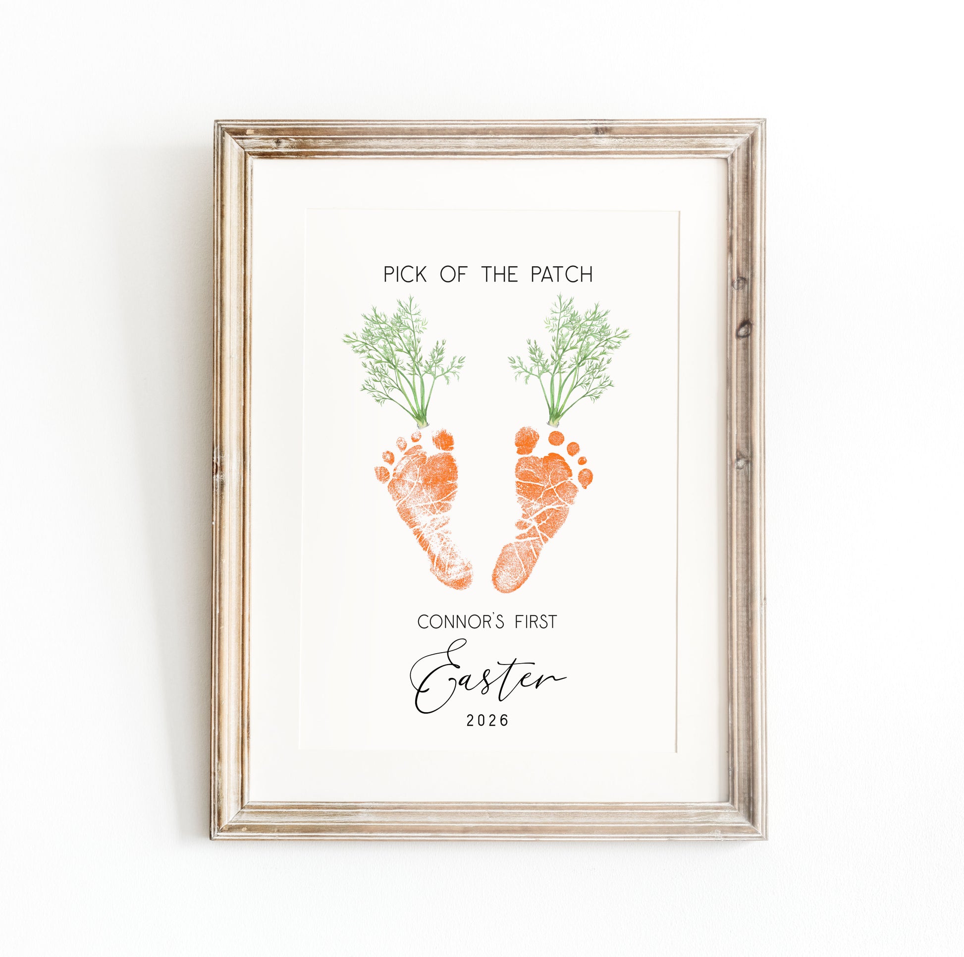 Framed keepsake with baby footprints and text on a white background