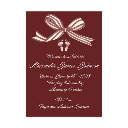 Red birth announcement card with a white bow and baby footprint design.