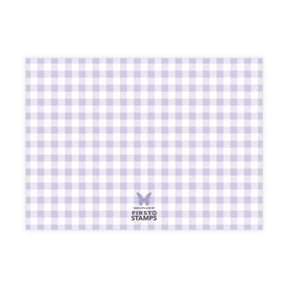Purple and white checkered paper with 'First Stamps' logo at the bottom right corner on a white background.