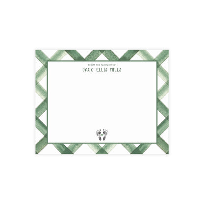 Note card with green and white checkered border and text 'From the Nursery of Jack Ellis Mills' and baby footprints.