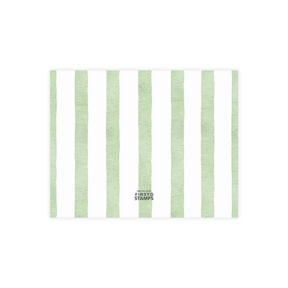Back of white card with green and white stripes. First Stamps Logo.