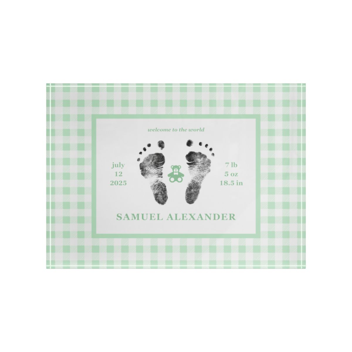 Green acrylic block with  baby footprints and text.