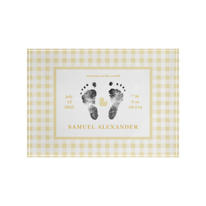 Yellow acrylic block with  baby footprints and text.