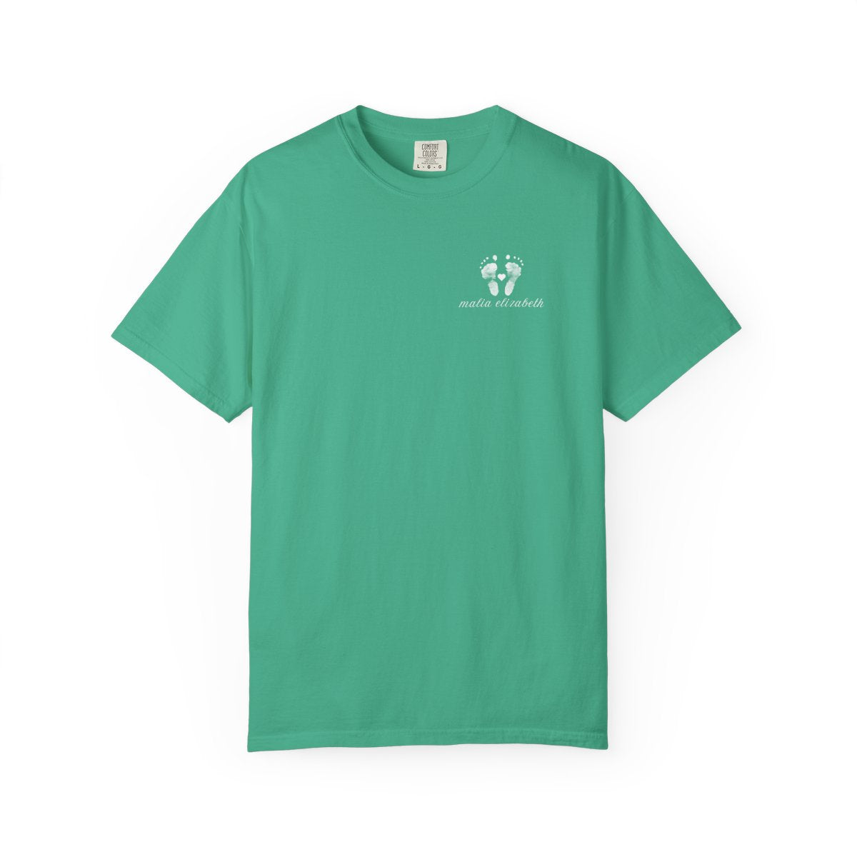 Island green t-shirt with a small baby footprint logo