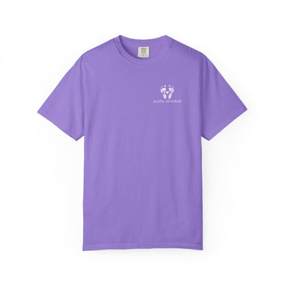 Violet t-shirt with a small baby footprint logo